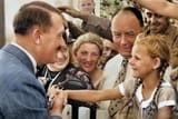 Hitler greeting a young girl