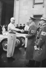Greeting of Adolf Hitler by the driver Rudolf Caracciola. 1939-02