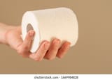 mans-hand-holding-giving-toilet-260nw-1669984828
