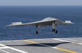 6C8232939-130710-drone-landing-hmed-546p[1]