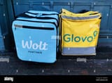 wolt-and-glovo-delivery-bags-are-seen-in-krakow-poland-january-20-2022-photo-by-beata-zawrzelnurphoto-2KD0XCX