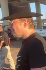 elon musk with the texan hat backwards