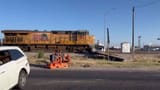 freight-train-vs-truck-690176707