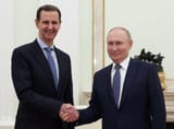2024-12-13T105925Z_1734548119_RC2629A2AGHV_RTRMADP_3_SYRIA-ASSAD-EXIT-scaled-e1734470383677