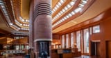 49a1ad17-332c-4330-bfdc-7c59526c4bf9-049-lower-level-view-of-fireplace-and-chimney-at-wingspread-in-wind-point