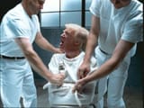 trump-in-straight-jacket-evhvzroxsaamat0