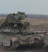 T-90 with ridiculous palette of jamming equipment on cage