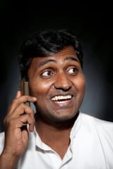 indian-man-talking-phone-18978715