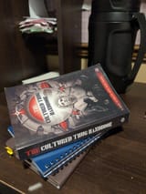 people holding the cultured thug handbook 4