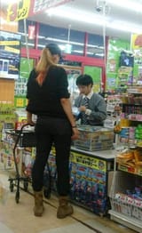 Tall tomboy at asian shop