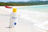 sunscreen-lotion-on-the-beach