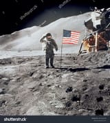 stock-photo-astronaut-gives-salute-beside-u-s-flag-during-eva-elements-of-this-image-were-furnished-by-nasa-2327422219