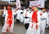 Shiites flagellate themselves in Karbala as they mark the anniversary of the death of Imam Hussein