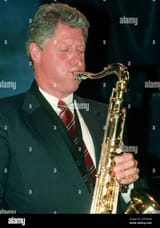 president-bill-clinton-closes-his-eyes-as-he-plays-the-saxophone-at-a-jazz-club-during-a-stop-in-manhattan-new-york-city-may-21-1991-scanned-from-negative-reutersevy-mages-emcmcpn-2D55EWA-280933371
