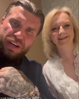 98948745-14846009-Liz_Truss_seen_in_a_video_with_Dougie_Joyce_as_the_bare_knuckle_-a-50_1750856287928
