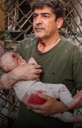 iranian shitskin holding shrapnelraped babby