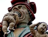 baby eating statue switzerland