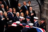 fat orange kike refuses to put hand over heart at Jimmy Carter&#039;s funeral