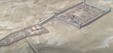 roman fort on hill and temple below connected by a ramp