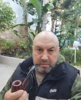 pipe enthusiast, possibly Russian general xaxa_1726336227237452