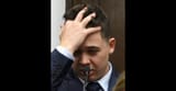 Rittenhouse-on-stand-head-in-hand-getty-704497172