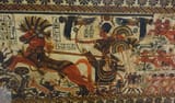 1280px-King_Tut_charging_enemies,_18th_dynasty