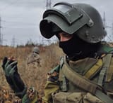 russian-soldier-with-a-butterfly-on-his-hand-v0-805o1zvx811a1