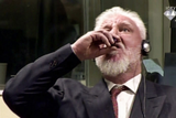 crotian war criminal at the hague drinks funny posion and kills himself