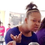 confused black girl shrug