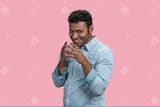 devious-indian-man-portrait-cunning-tricky-face-smirk-273948394