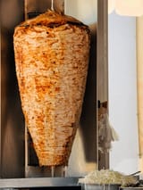 doner-kebab-on-rotating-vertical-600nw-1294590781