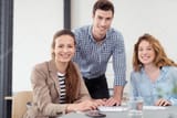 depositphotos_83314978-stock-photo-young-office-people-smiling-at
