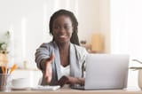 female-hr-manager-extending-hand-handshake-successful-job-interview-recruitment-concept-friendly-black-camera-165655208