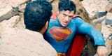 david-corenswet-s-superman-getting-up-from-a-crater-with-a-citizen-s-help-in-the-superman-movie-trailer
