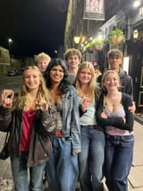Pinterest - pattyuriaa (pattyuriaa) - a group of young people standing next to each other in front of a building at night