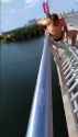 Chinaman dives into the water from bridge at extreme height_thumb.jpg