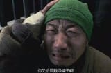 sad-green-hat-man-3615061028