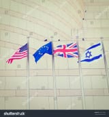 stock-photo-flags-us-uk-eu-and-israel-in-front-of-the-granite-facade-retro-effect-195172865