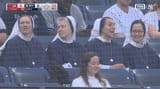 some-nuns-in-yankees-colored-tunics-and-veils-enjoying-the-v0-lofrcggxlk7f1