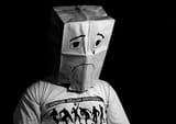 sad-face-paper-bag
