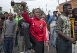 27B0A3A900000578-3044680-Violent_Gangs_of_anti_immigrant_protesters_armed_with_hammers_kn-a-70_1429365886624