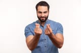 cunning-mercantile-man-beard-rubbing-fingers-showing-money-gesture-asking-salary-demanding-bribe-looking-camera-grin-211379284