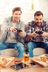 40219098-we-love-this-game-two-cheerful-young-men-playing-video-games-while-sitting-on-sofa