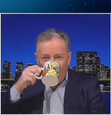 sips coffee