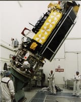 1024px-NOAA-L_satellite_tilted_in_Vandenberg_AFB_clean_room