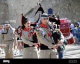 palestinian-christian-scouts-play-bagpipes-in-a-christmas-eve-procession-in-manger-square-outside-the-church-of-nativity-where-tradition-believes-jesus-christ-was-born-in-bethlehem-west-bank-december-24-2011-upidebbie