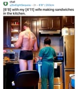 man taller than woman scrubs sandwiches 