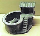 Green_glazed_toilet_with_pigsty_model._Eastern_Han_dynasty_25_-_220_CE