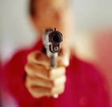 gun-pointed-at-someone