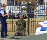 11021220-6811785-A_man_wearing_military_fatigues_pictured_was_arrested_outside_Pa-m-24_1552646469901